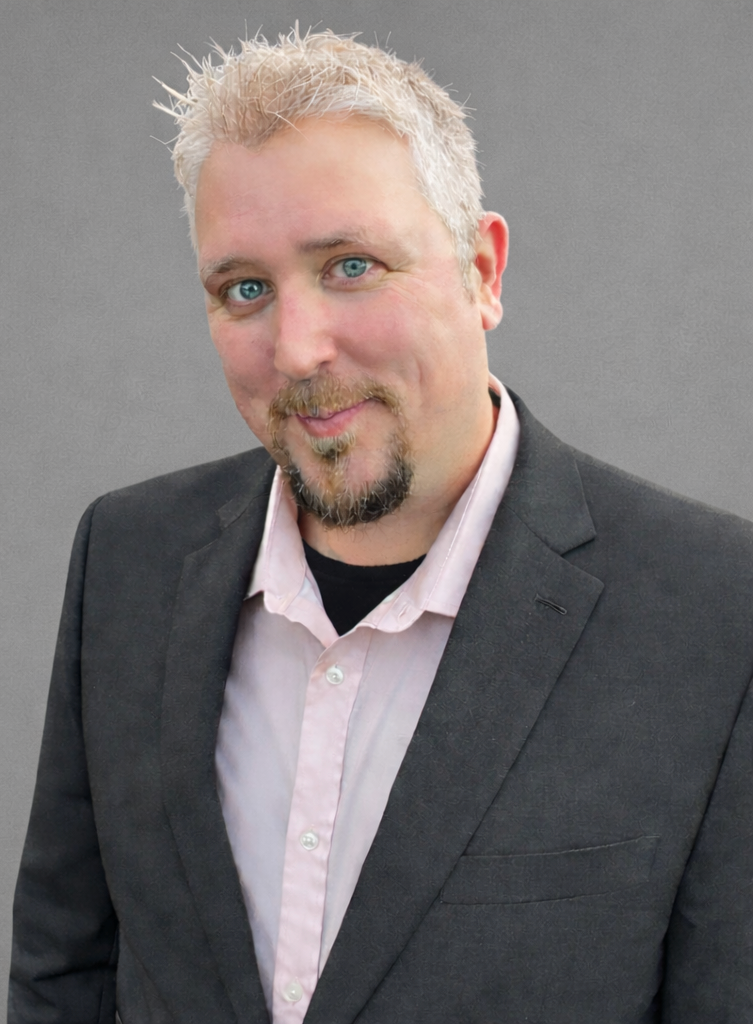 Photo of Jonathon Gouge, grey suit